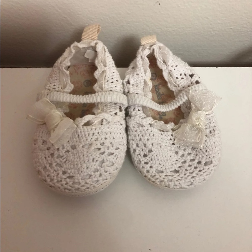 White baby shoes
